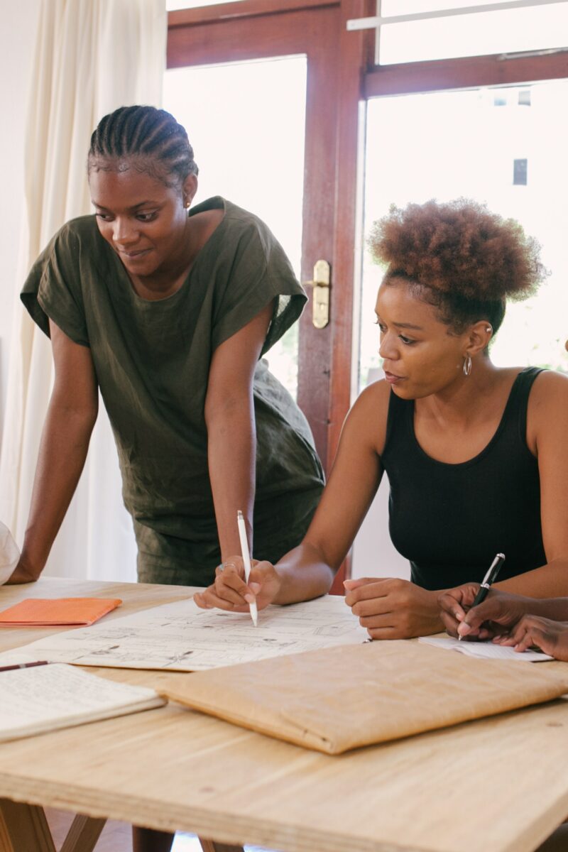 five women studying scaled